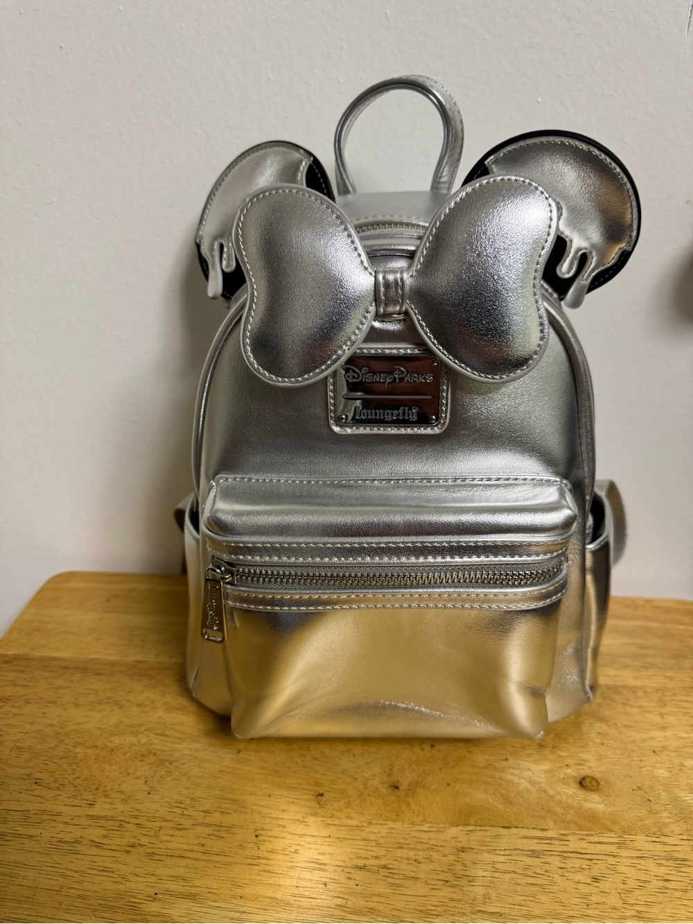 Loungefly - 100 Years Of Wonder- Metallic Silver Mini Backpack with Bow